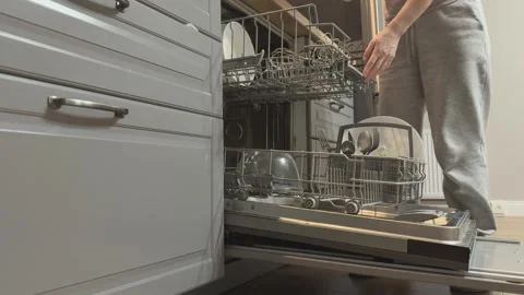 Loading Dirty Dishes Into Upper Rack Dishwasher Kitchen Cleaning Routine Close Stock-Footage 336442157