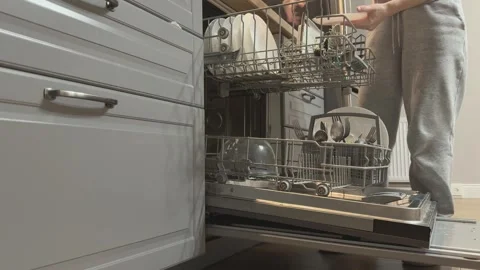 Loading Dirty Plates Into Upper Rack Of Dishwasher Kitchen Cleaning Routine 스톡 동영상 336442503