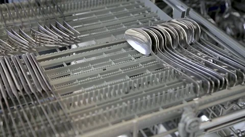 Loading dishes,spoons into the dishwasher Stock Footage 167797298