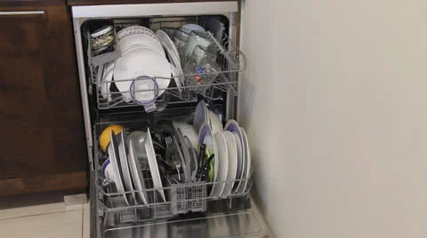 Loading the dishwasher Stock Footage 22670364