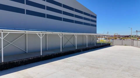 Loading Dock of a Modern Logistics Warehouse Stock Footage 339245157