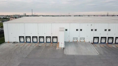 Loading Docks Of A Industrial Warehouse In Business Park Stock Footage 156571812