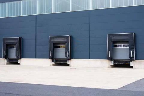 Loading docks of a modern warehouse building exterior Stock Photos