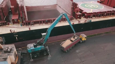Loading a dry cargo ship in the port Stock Footage 147057481