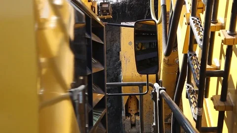Loading a dump truck (view behind) (open pit)  Stock Footage 83486022