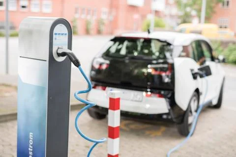 Loading an electric car 写真素材
