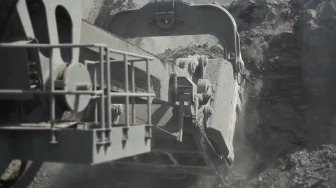 Loading of excavator bucket and turning of it Stock Footage 50324658