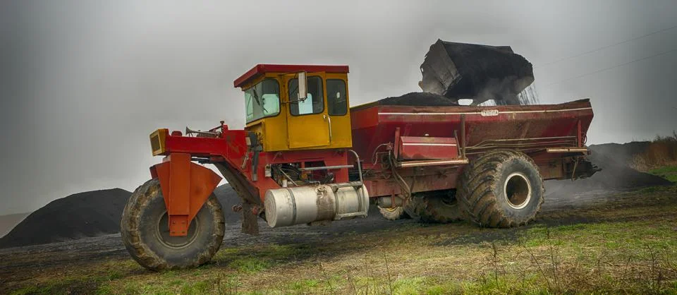 Loading the fertilizer. Stock Photos