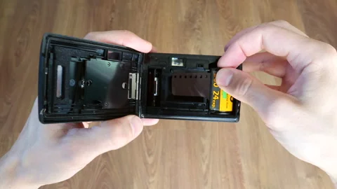 Loading Film Into Compact Film Camera Stock-Footage 240703398