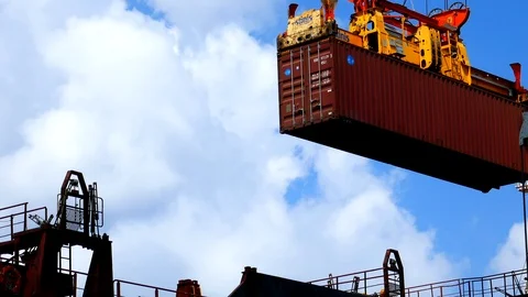 Loading a freight ship with 40 feet container 4k intro video for business Stock-Footage 96335513