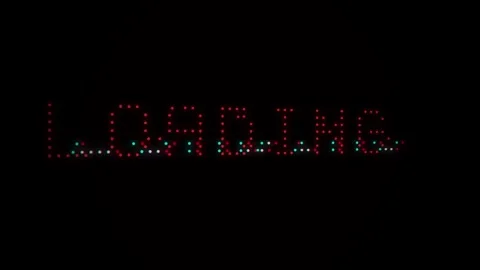 Loading glitch Red LED text on black background Stock Footage 340253176