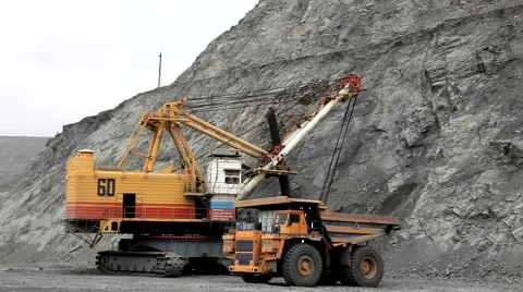Loading gold ore in a body of 140-ton truck Stock Footage 6930261
