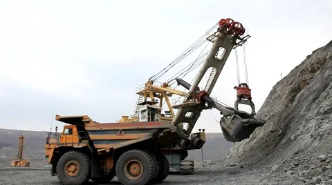 Loading gold ore in a body of 140-ton truck Stock Footage 6930292
