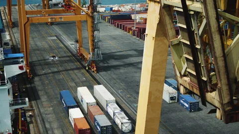 Loading goods in the seaport on the ship. container port. Export transportation Video stock 197576570