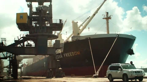 Loading grain in big ship at Odessa port Stock Footage 64127297