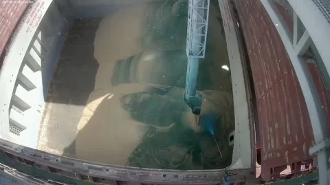 Loading of grain on a ship to the port. Coloring of grain Stock Footage 154361589