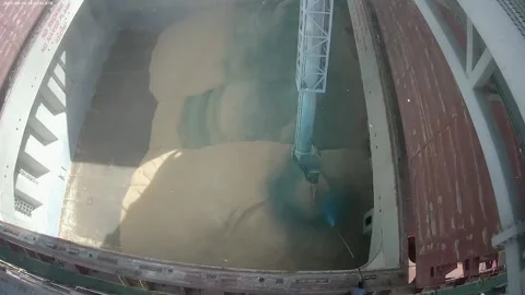 Loading of grain on a ship to the port. Coloring of grain Stock Footage 154361658
