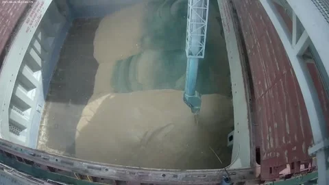 Loading of grain on a ship to the port. Coloring of grain Stock Footage 154362078
