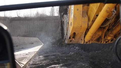 Loading of ground into a dump truck (open pit) Stock Footage 83487322