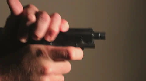 Loading a gun, Closeup Stock Footage 23156921