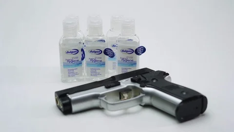 Loading Gun Next To Pocket Disinfect Stock Footage 126014501