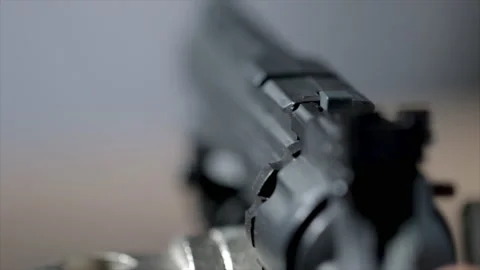 Loading gun revolver barrel close up. Cocking gun 6 shot revolver. Stock Footage 213396766