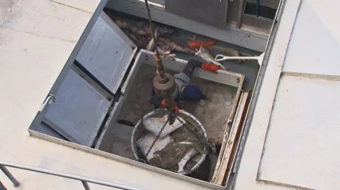 Loading the Halibut Bucket from the Boat's Hold 2 Stock Footage 8563900