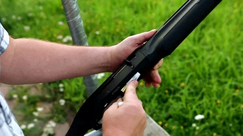 Loading a high-speed rifle for close-up shooting Stock Footage 117092118