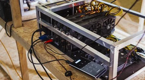 Loading the HiveOS operating system. Preparation of a new mining farm. Three GTX Stock Photos