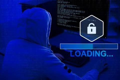 Loading information, screen with code. Hacker in sweatshirt 스톡 사진
