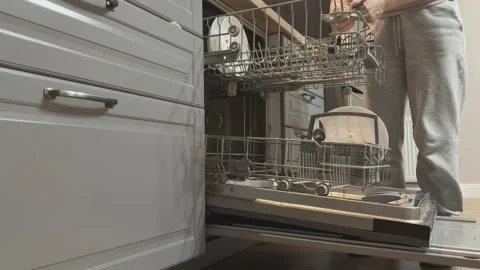 Loading Kitchen Tools Into Dishwasher Silicone Utensils Household Routine Video stock 336443154