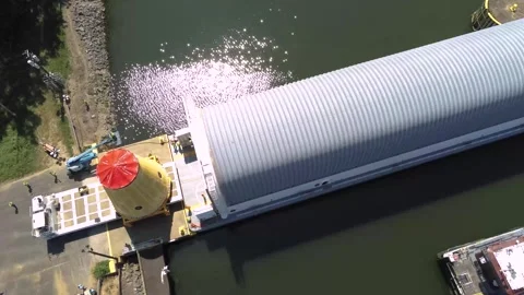 Loading of Launch Vehicle Stage Adapter for Artemis II onto Pegasus Barge, AL Stock Footage 282881488