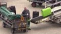 Loading luggage on airplane HD Footage