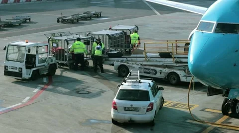Loading Luggage onto the Plane Stock Footage 46669896