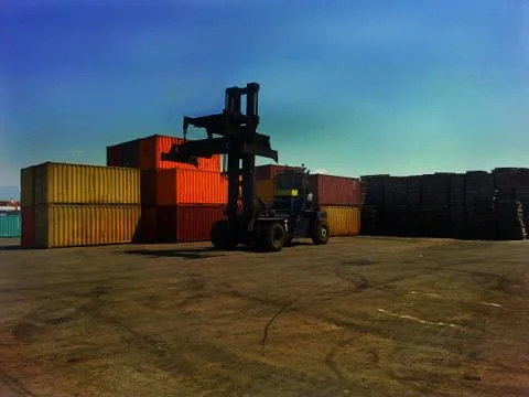 Loading-machine and ship containers Stock Photos
