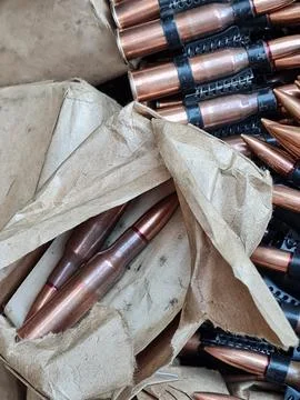 Loading machine gun belt Stock Photos