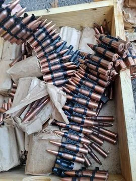 Loading machine gun belt Stock Photos