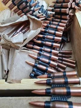 Loading machine gun belt Stock Photos