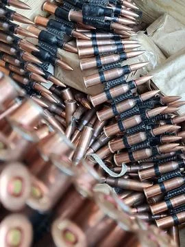 Loading machine gun belt Stock Photos