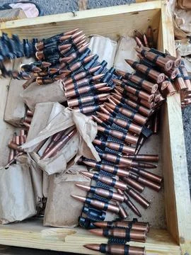 Loading machine gun belt Stock Photos