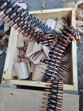 Loading machine gun belt Stock Photos