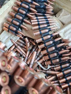 Loading machine gun belt Stock Photos