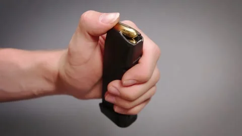 Loading a magazine Stock Footage 132291226