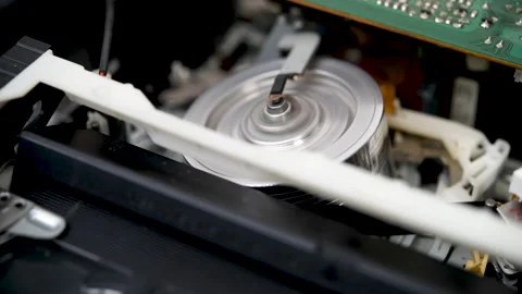 The loading mechanism in a VHS video recorder works Stock Footage 323562873