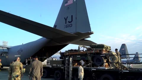 Loading military cargo onto C-130 aircraft Video stock 131888230