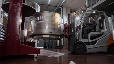Loading moment of basket of wine press with forklift truck for wine production Stock Footage 268750565