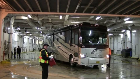 Loading a motor home into Alaskan ferry. Stock Footage 79415283