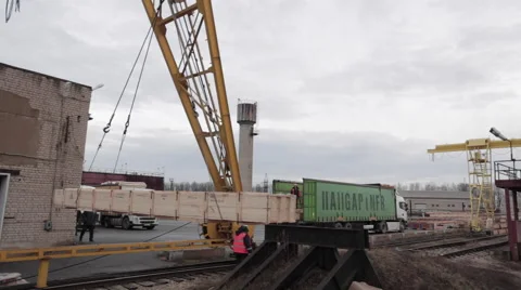 Loading operations with rail crane in the dock Stock Footage 62084405