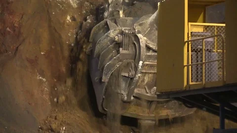 Loading the ore into heavy dump truck at the opencast mining site Stock Footage 83252443