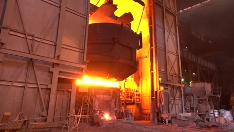 Loading of ore in the open-hearth furnace at a metallurgical plant Video stock 256484274